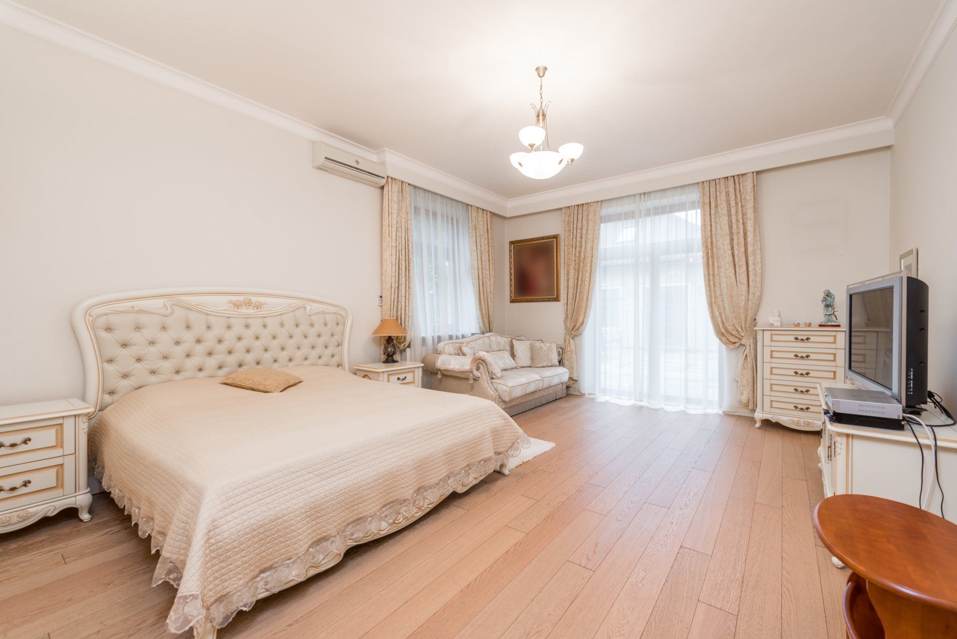 There is a large bed in the middle of the room.