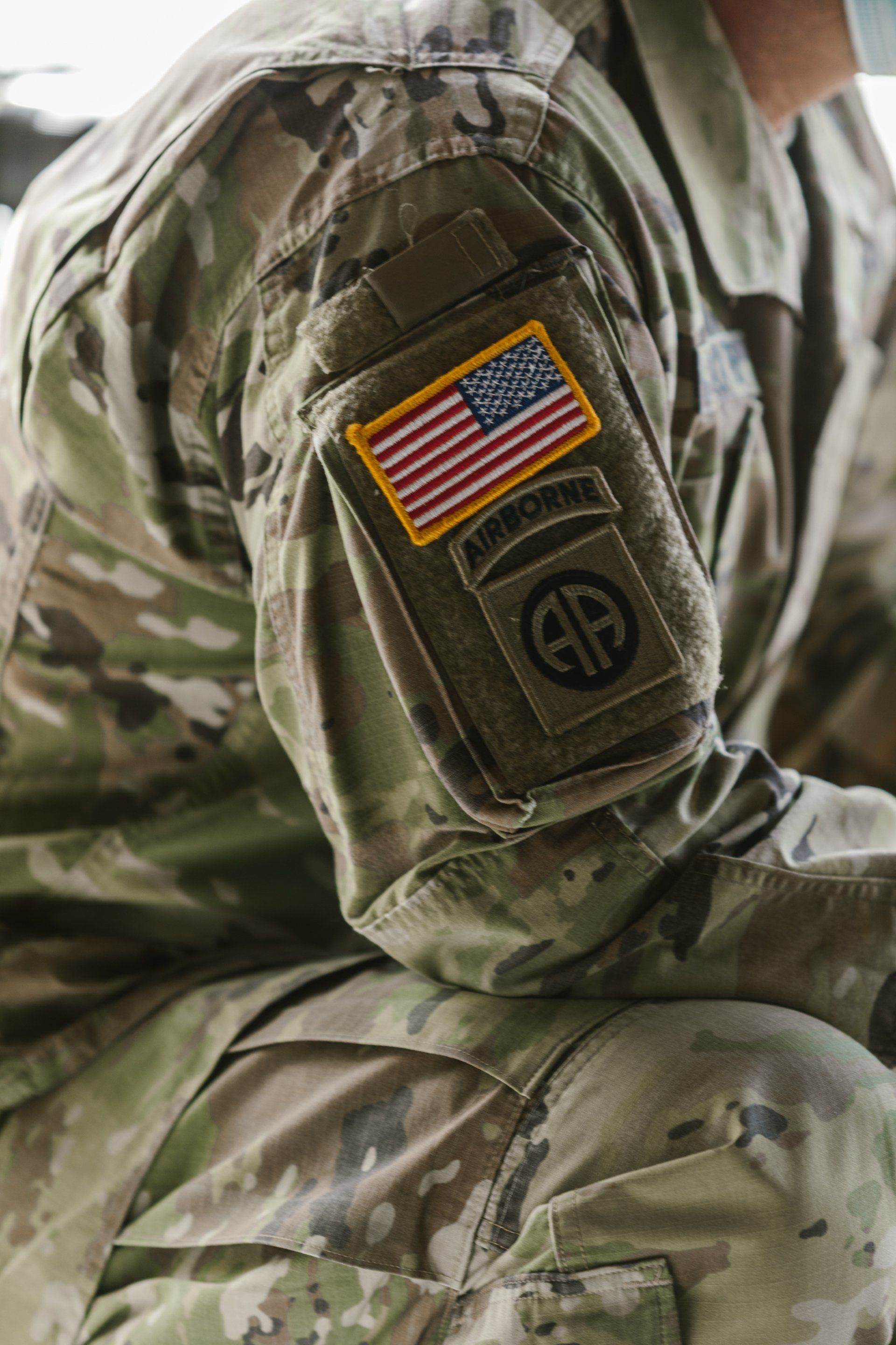 A close up of a soldier 's arm with a patch on it.