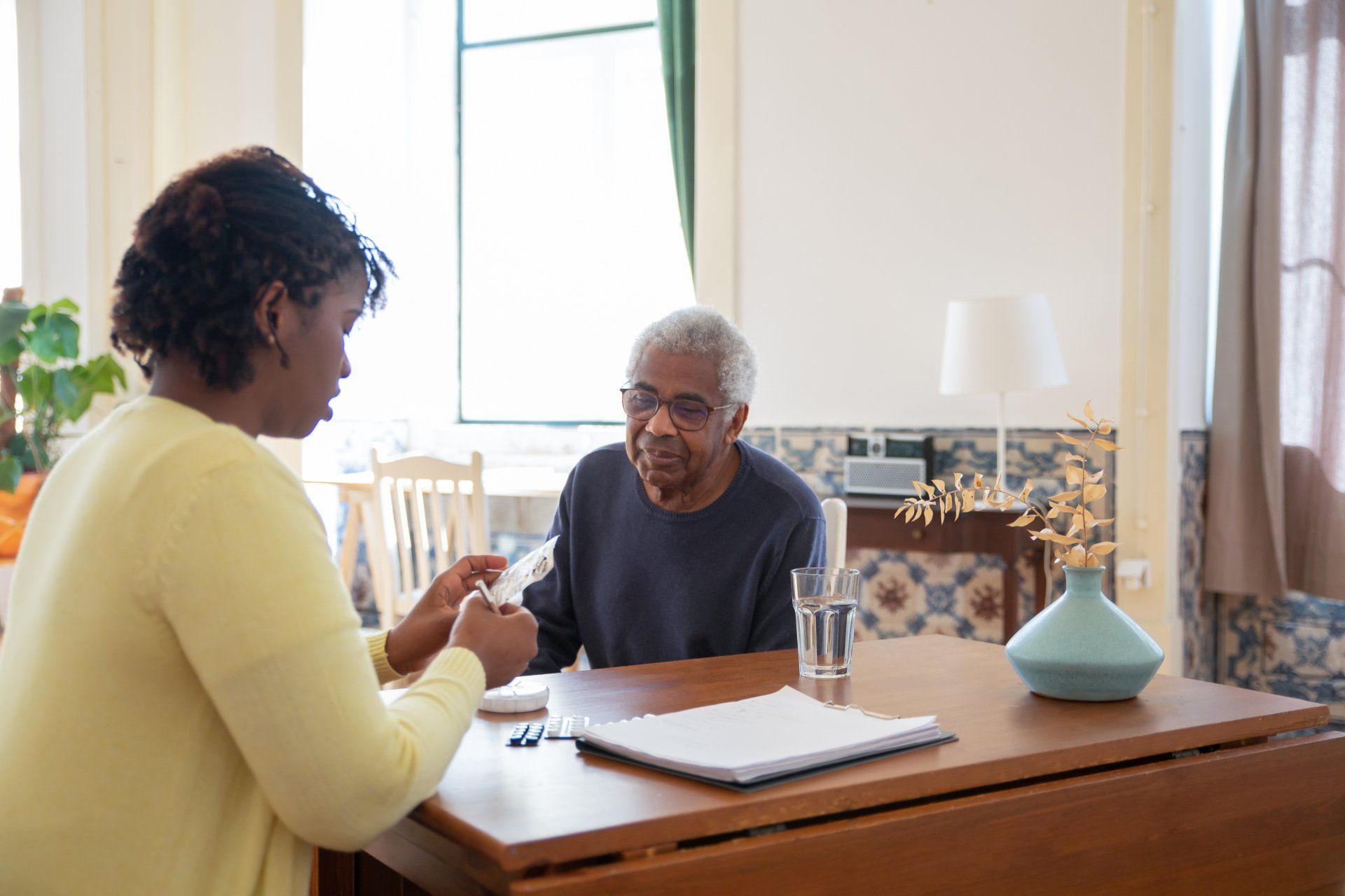 Daughter talking to older parent