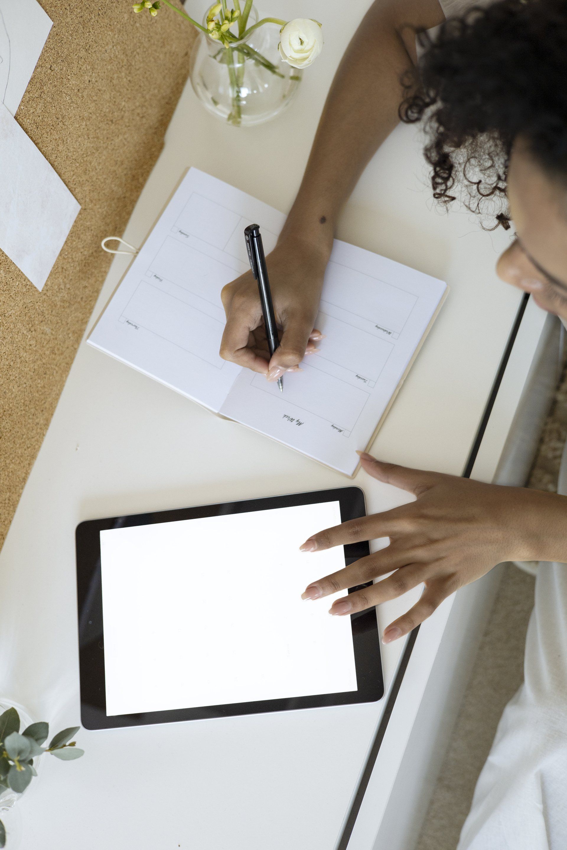 woman holding a planner