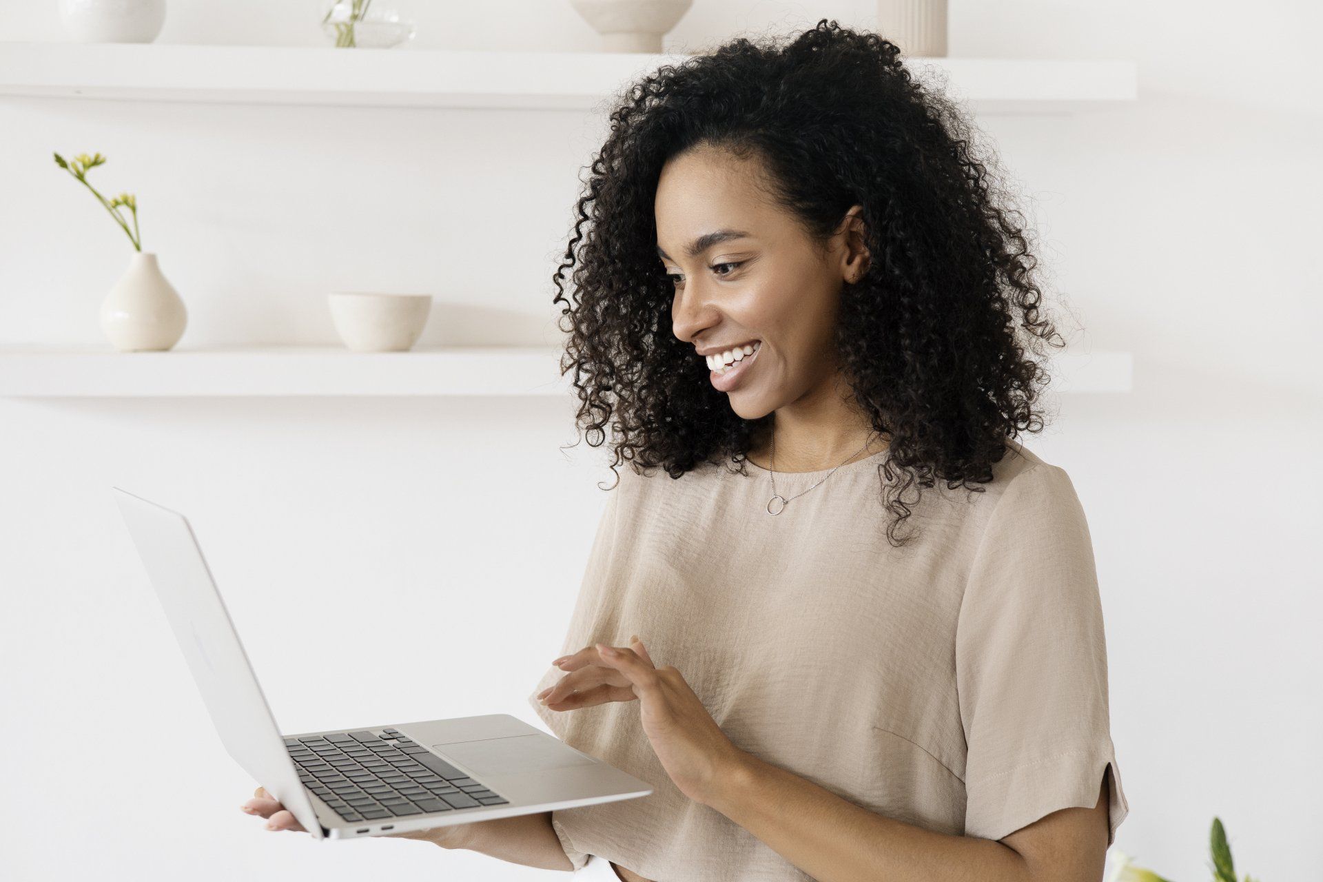 Woman Smiling at computer