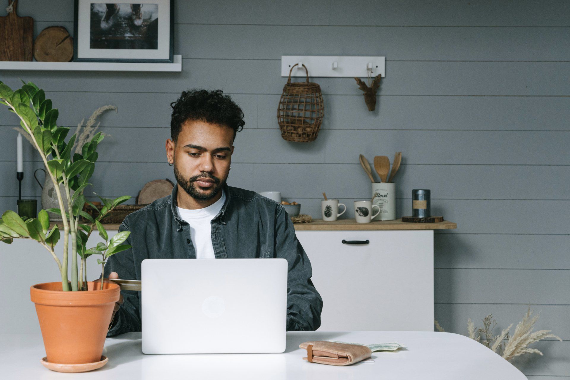 man in front of his laptop