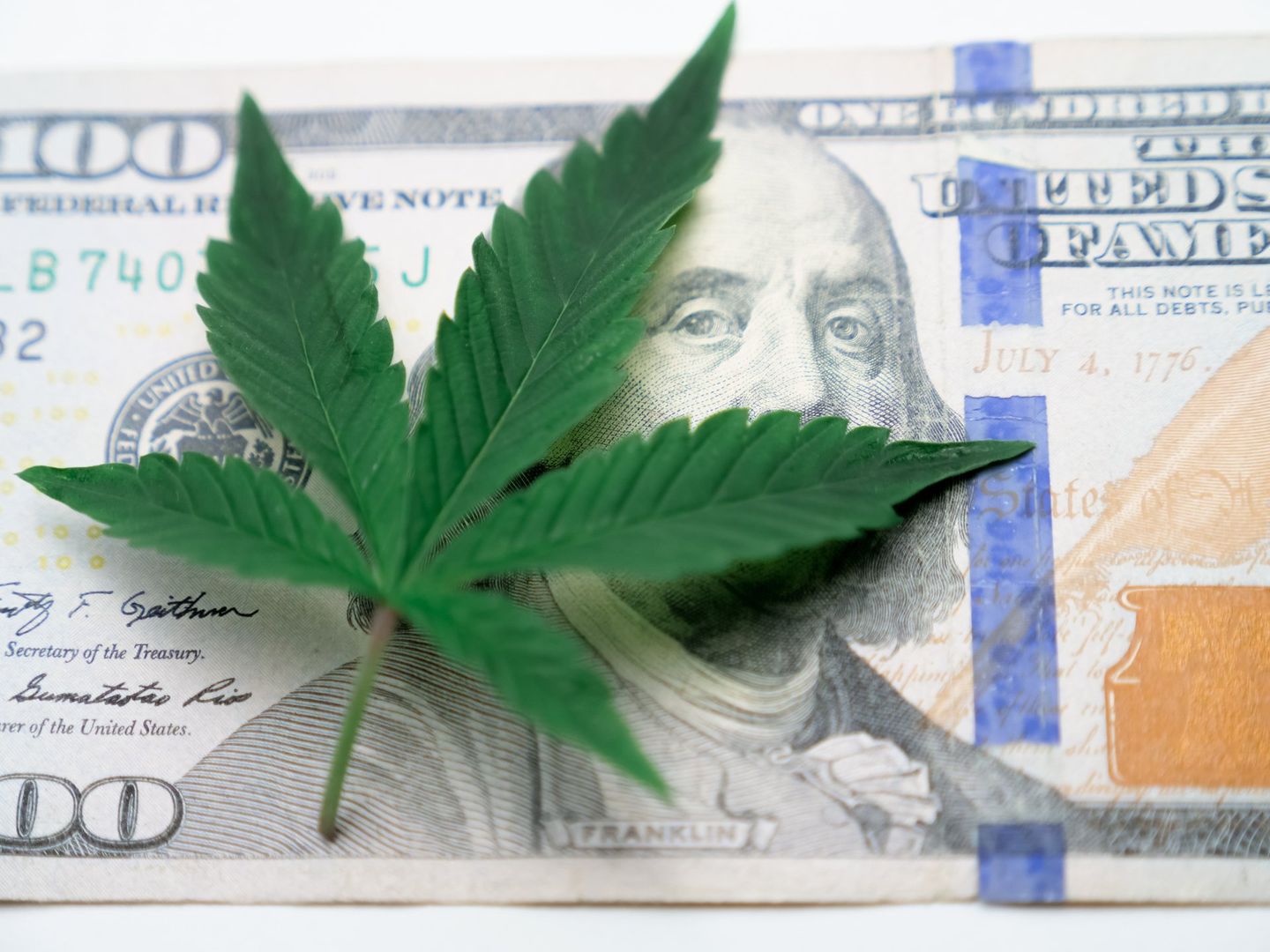 A Money With Cannabis on Top