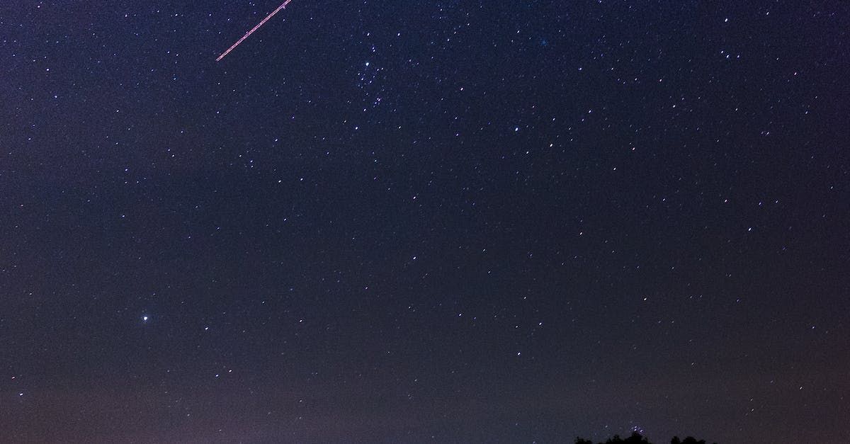 shooting star across night sky