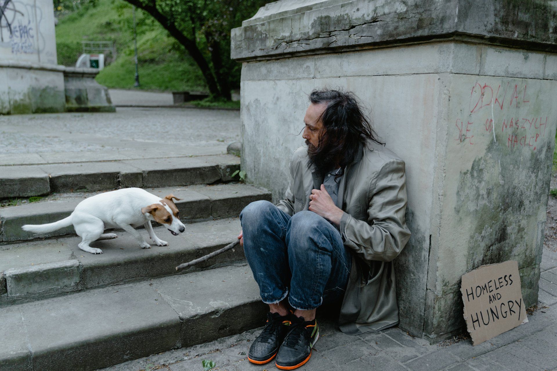 homeless man with dog