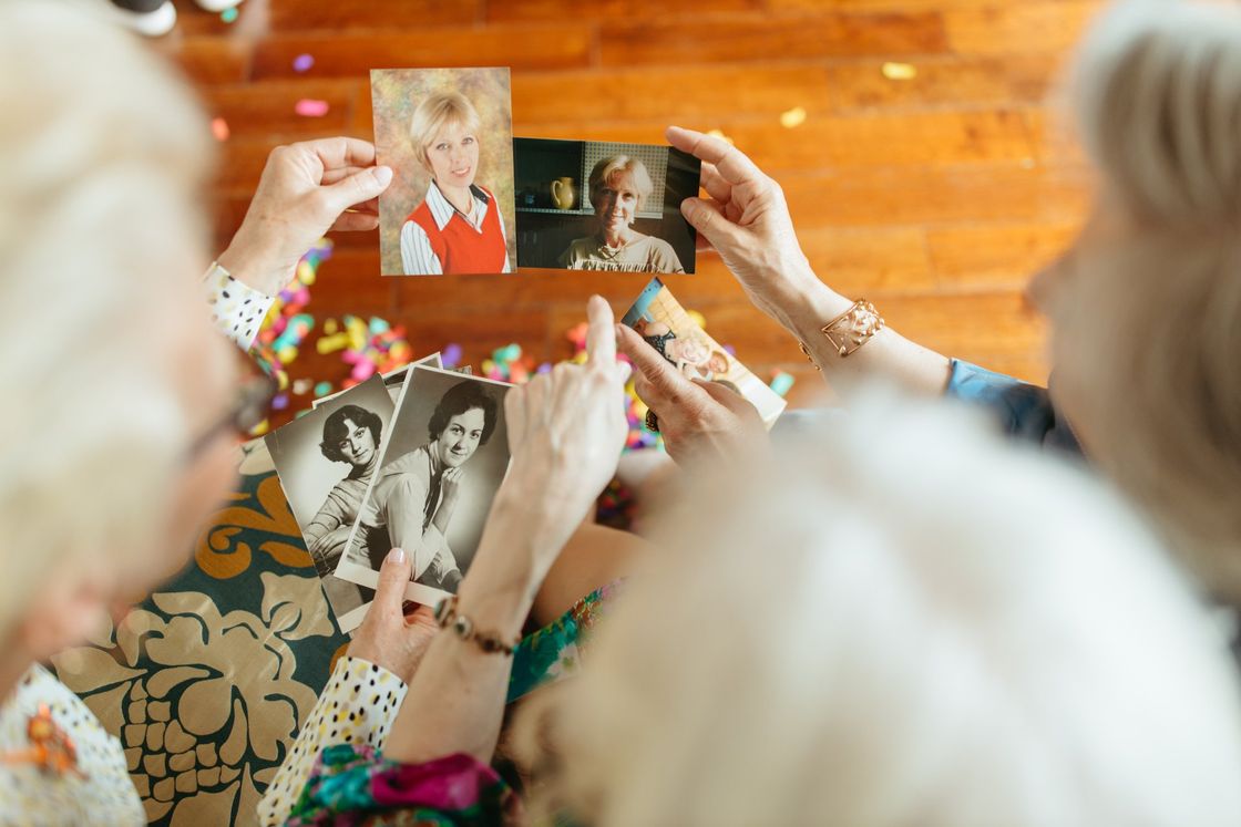 person looking at photographs
