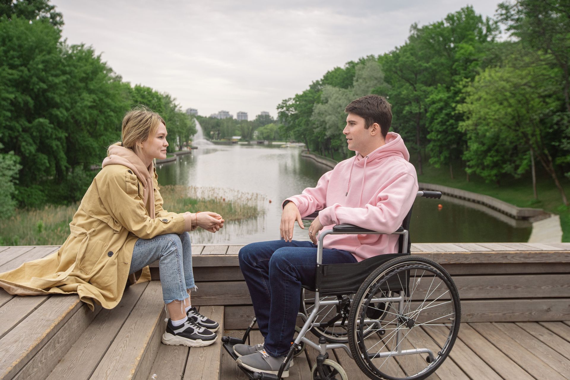 Carer and person with disability enjoying quality time outside during respite care