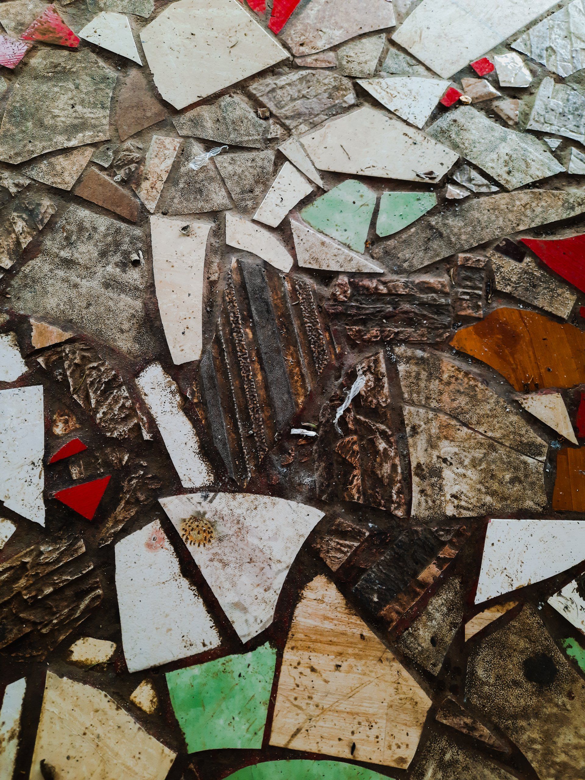 A close up of broken tiles.