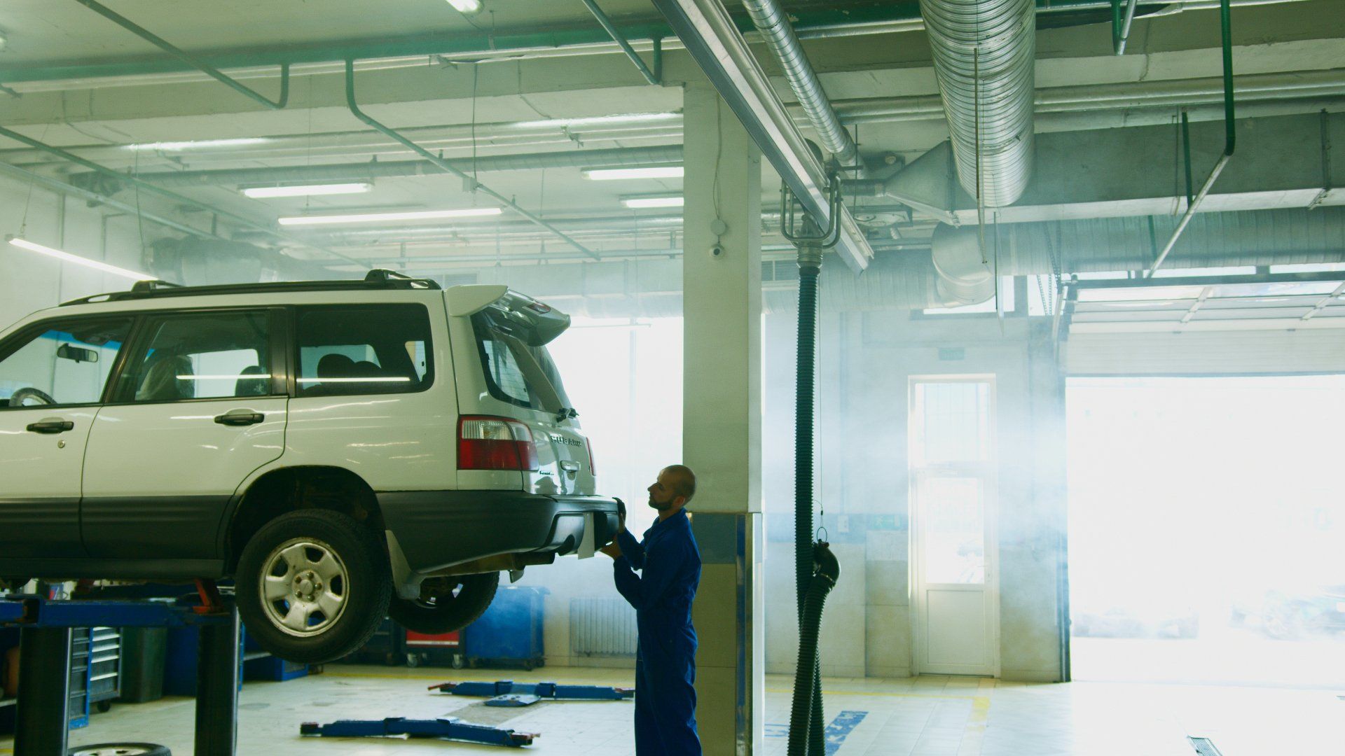Mechanic Performing a Vehicle Inspection on a Car | A-1 Brightside Auto LLC