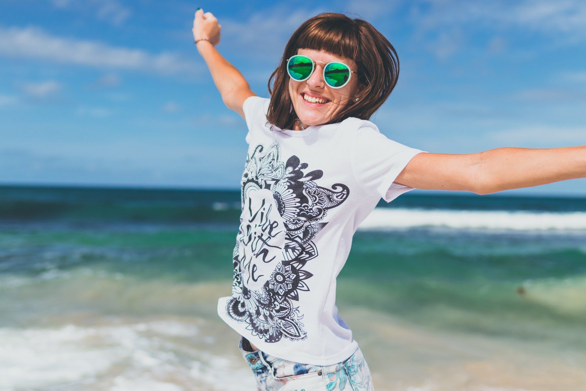 Second Summer is Outdoor Fun in the Sun. Pictured is a female wearing sunglasses