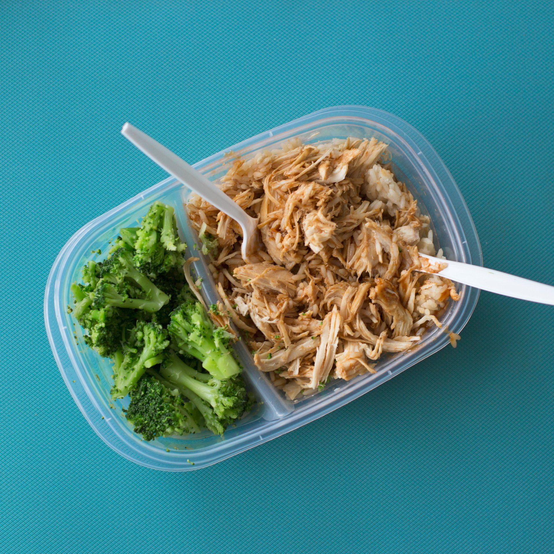 Plate with broccoli and shredded chicken