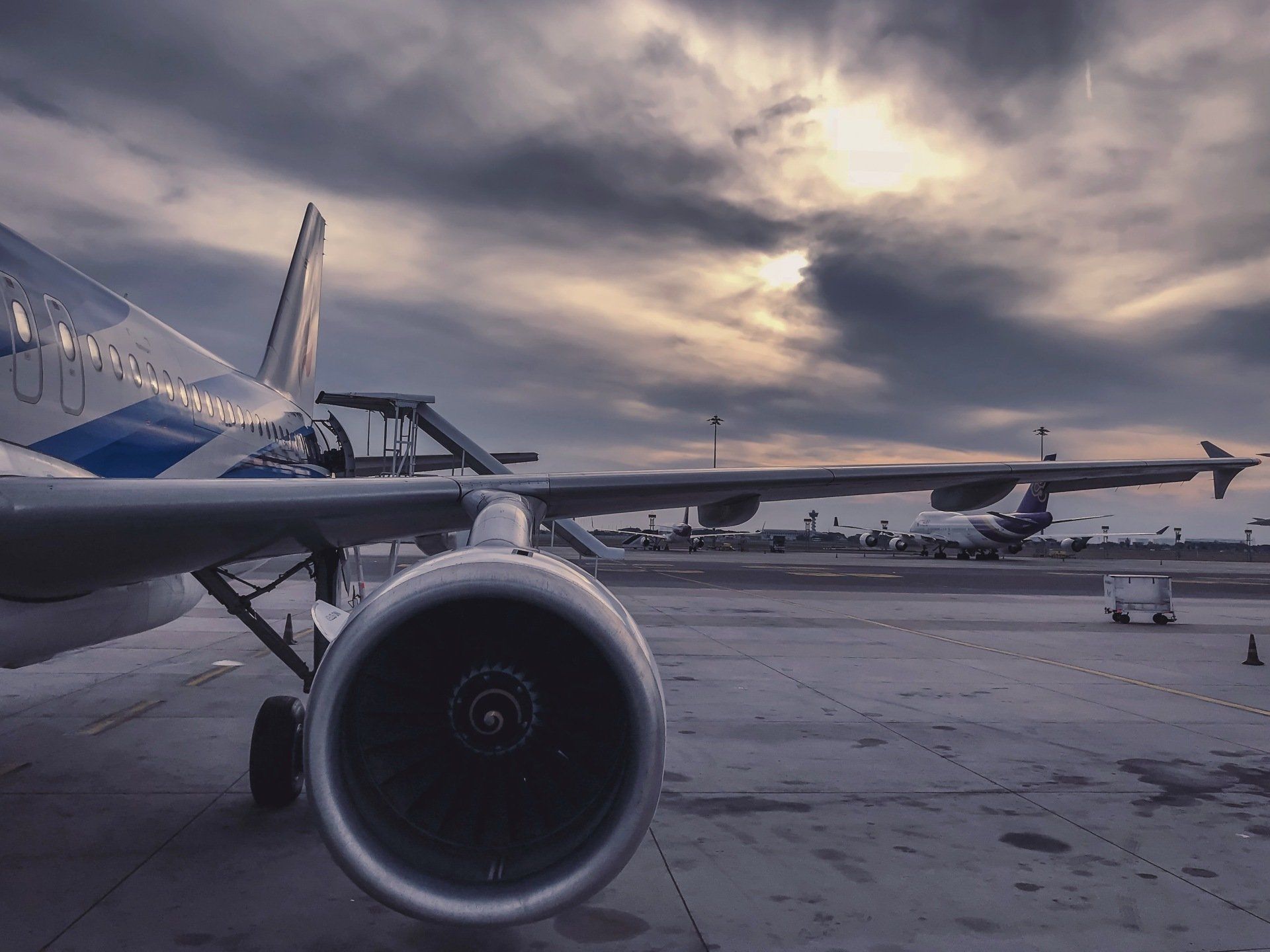 An airplane is parked on the tarmac at an airport.