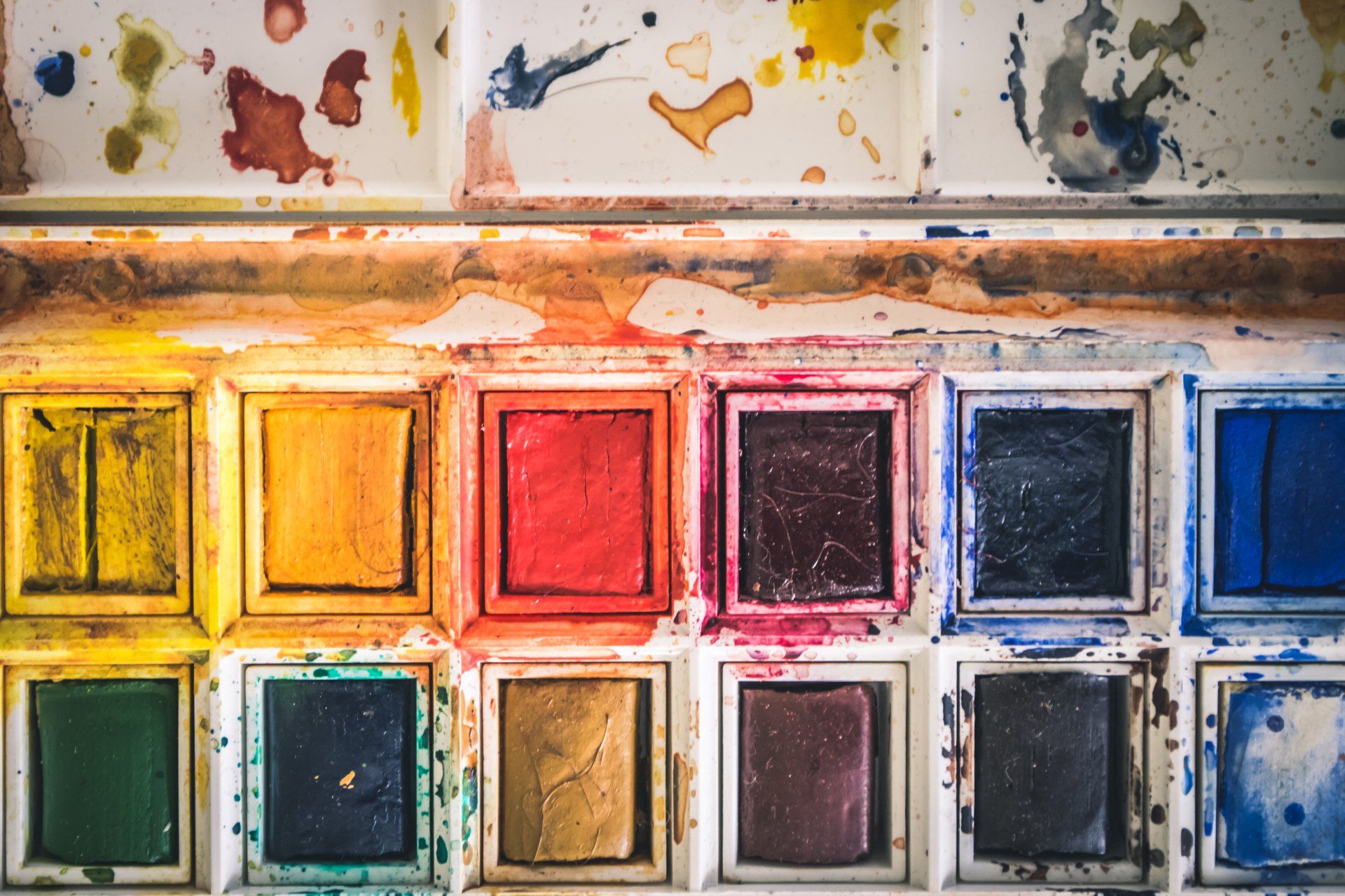 Close-up of colorful watercolor paint palette