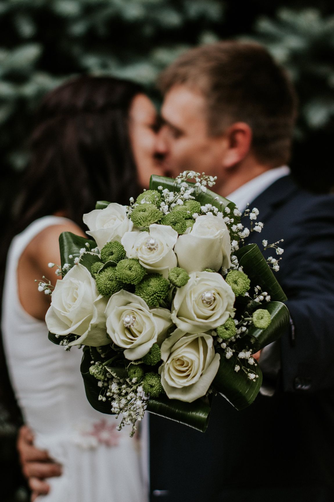 newlywed couple kissing