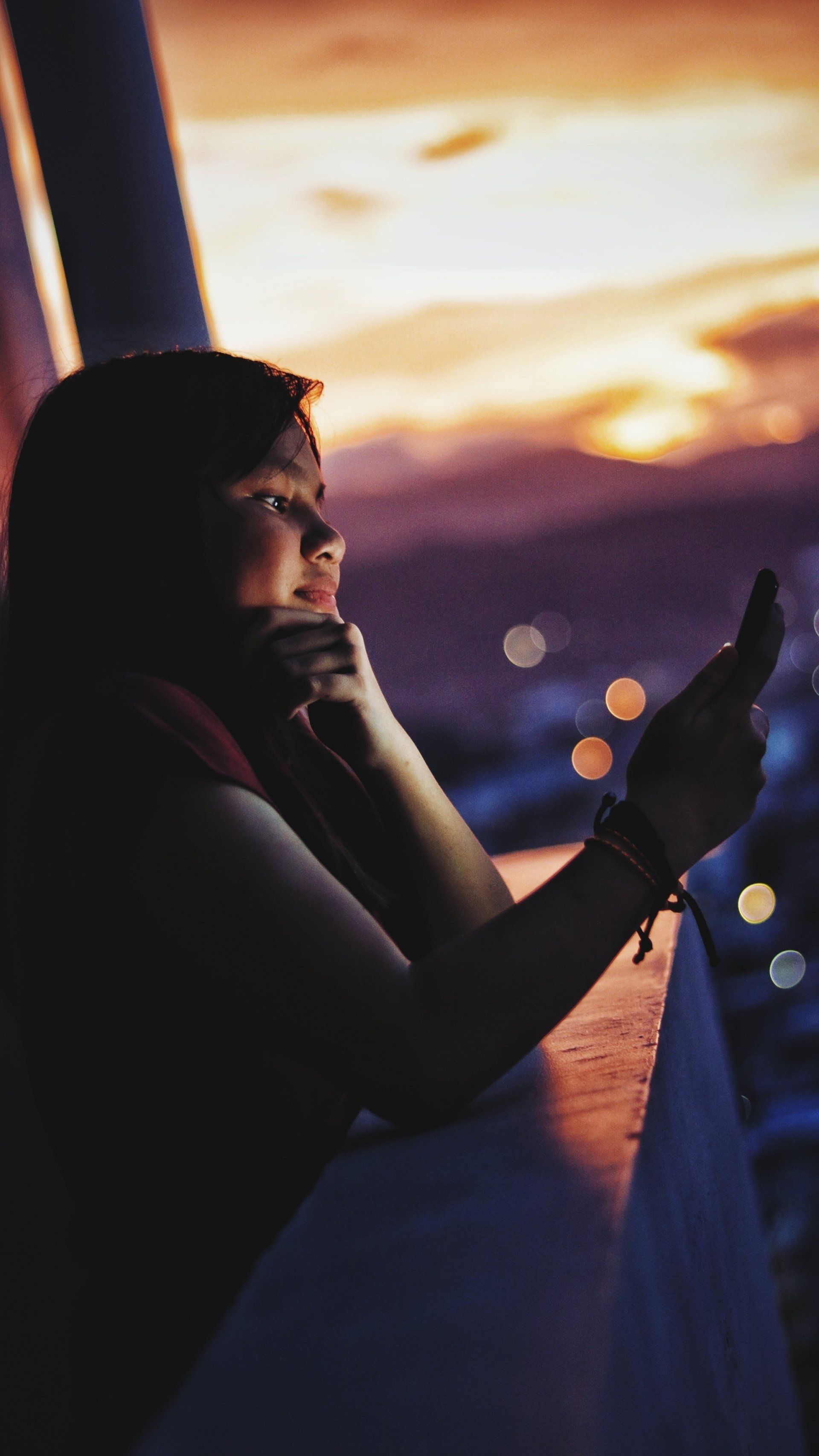 woman looking at phone