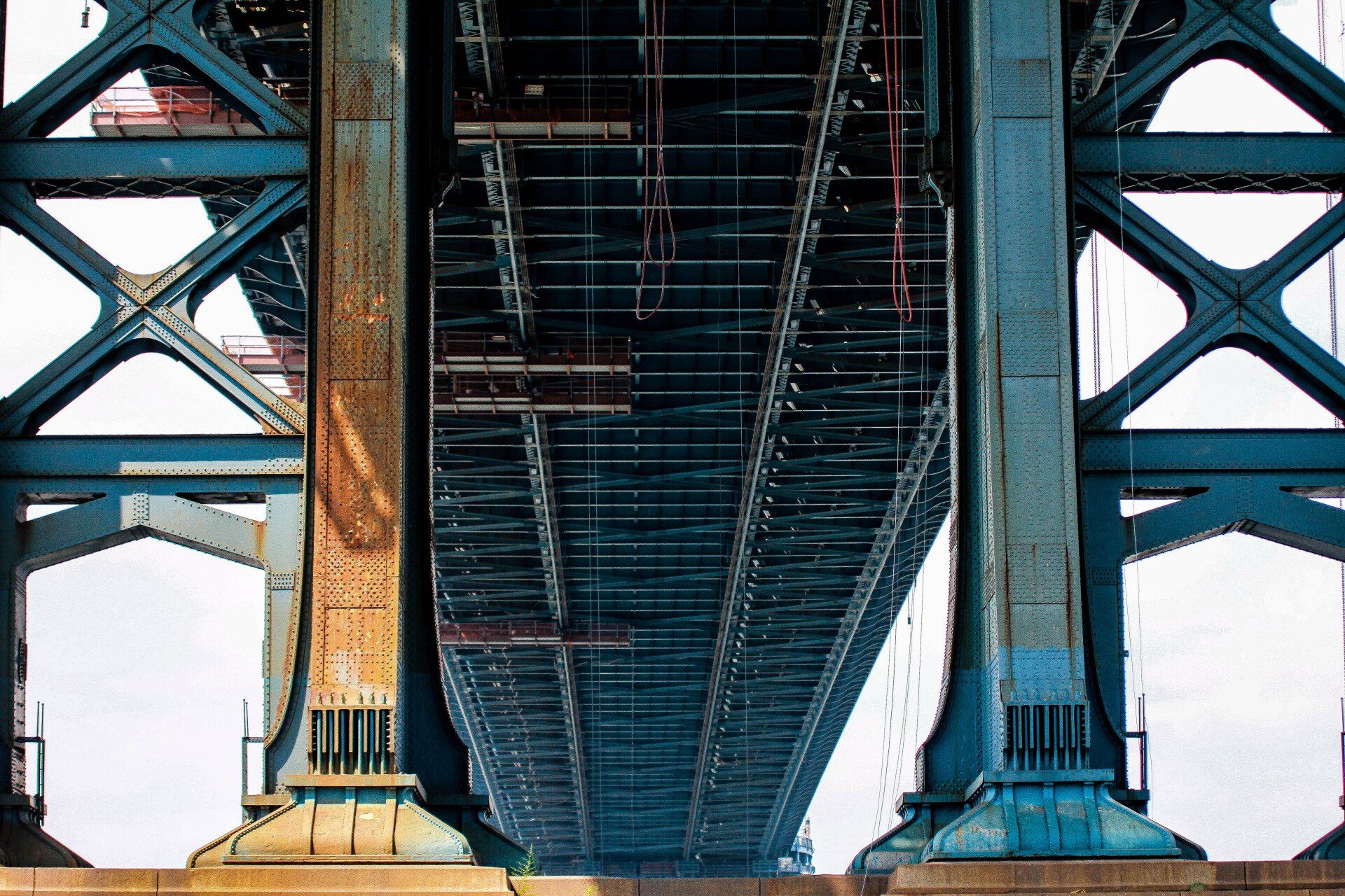 A close up of the underside of a bridge