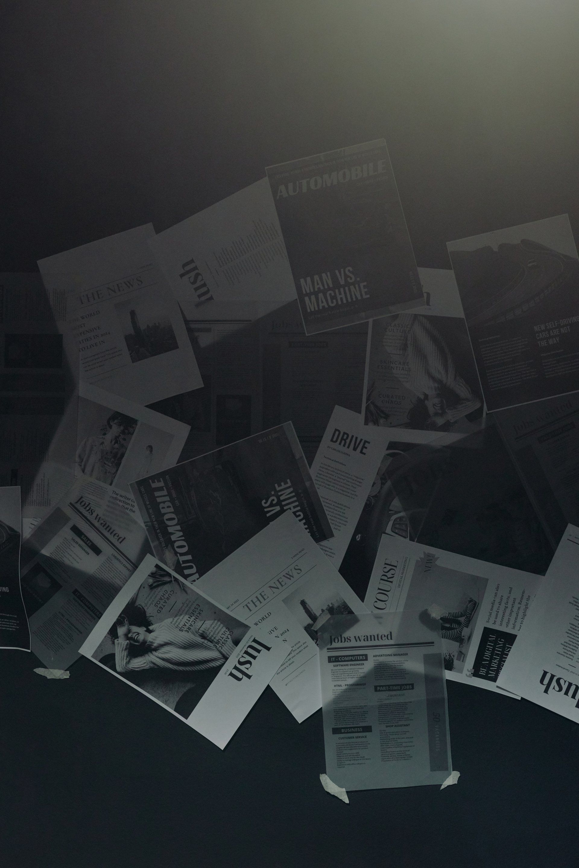 A bunch of magazines are laying on a table