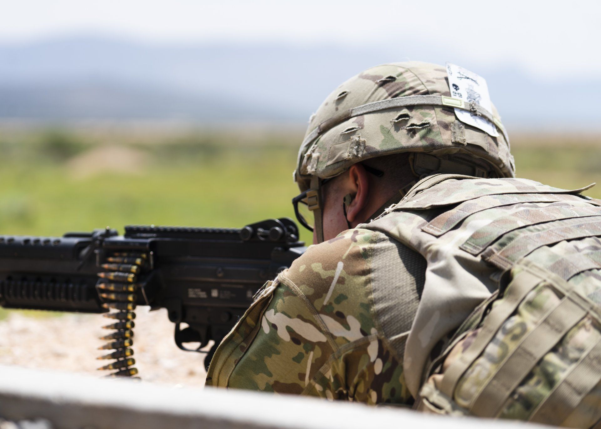 army person aiming rifle