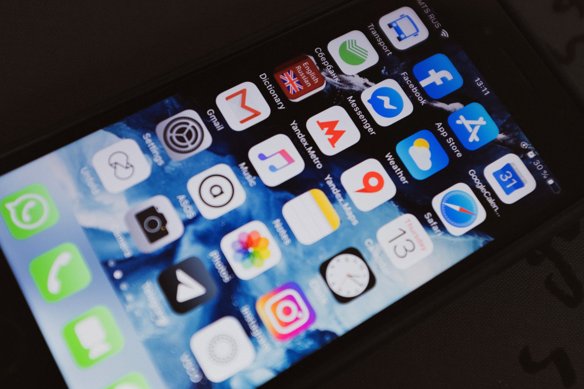 A cell phone with a lot of apps on it