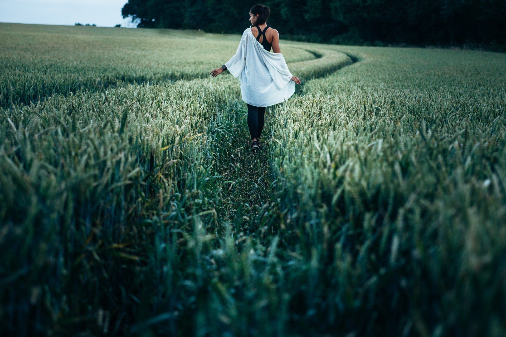 Woman walk field refection