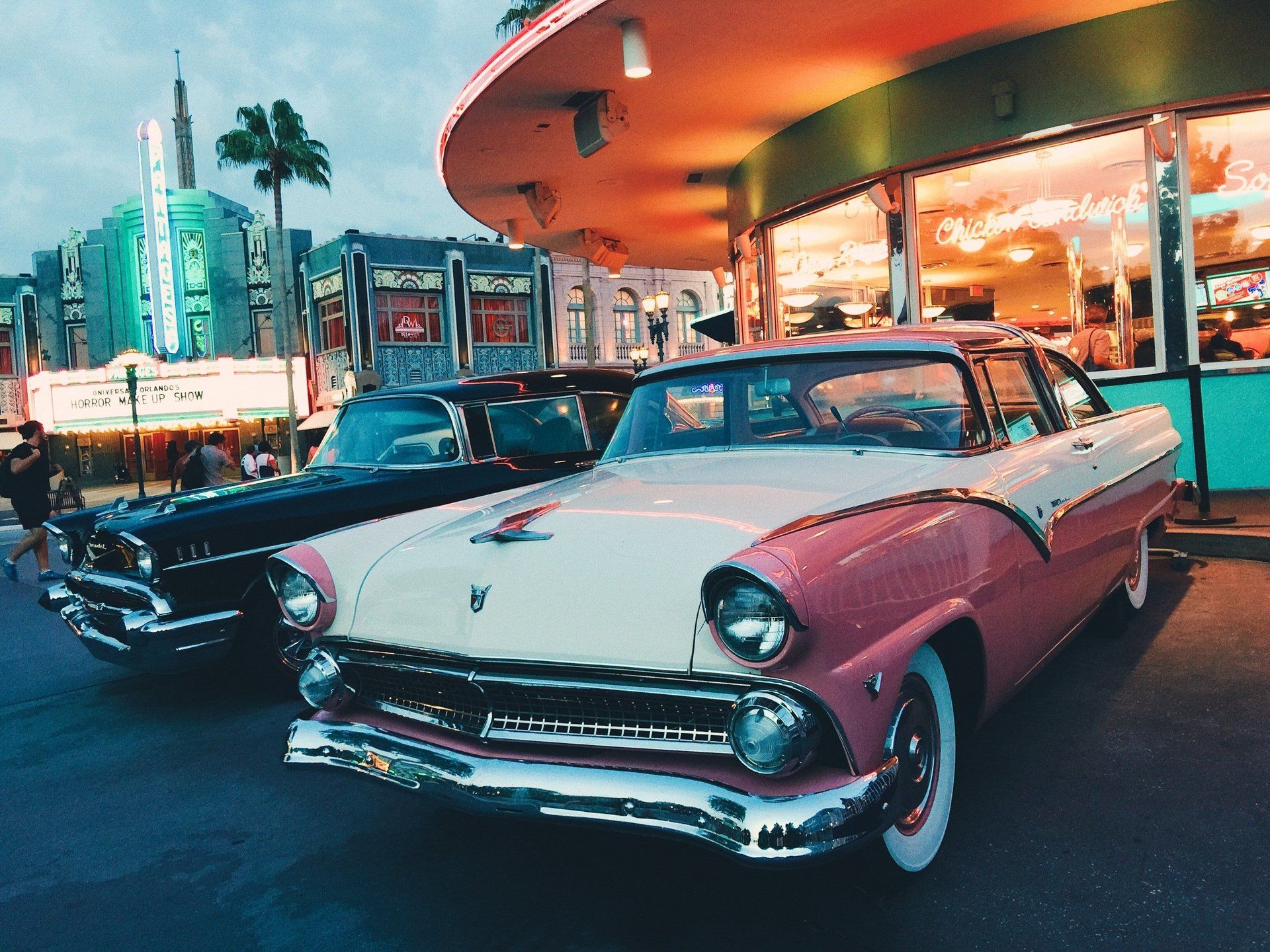 Classic Vehicles in front of art deco theater