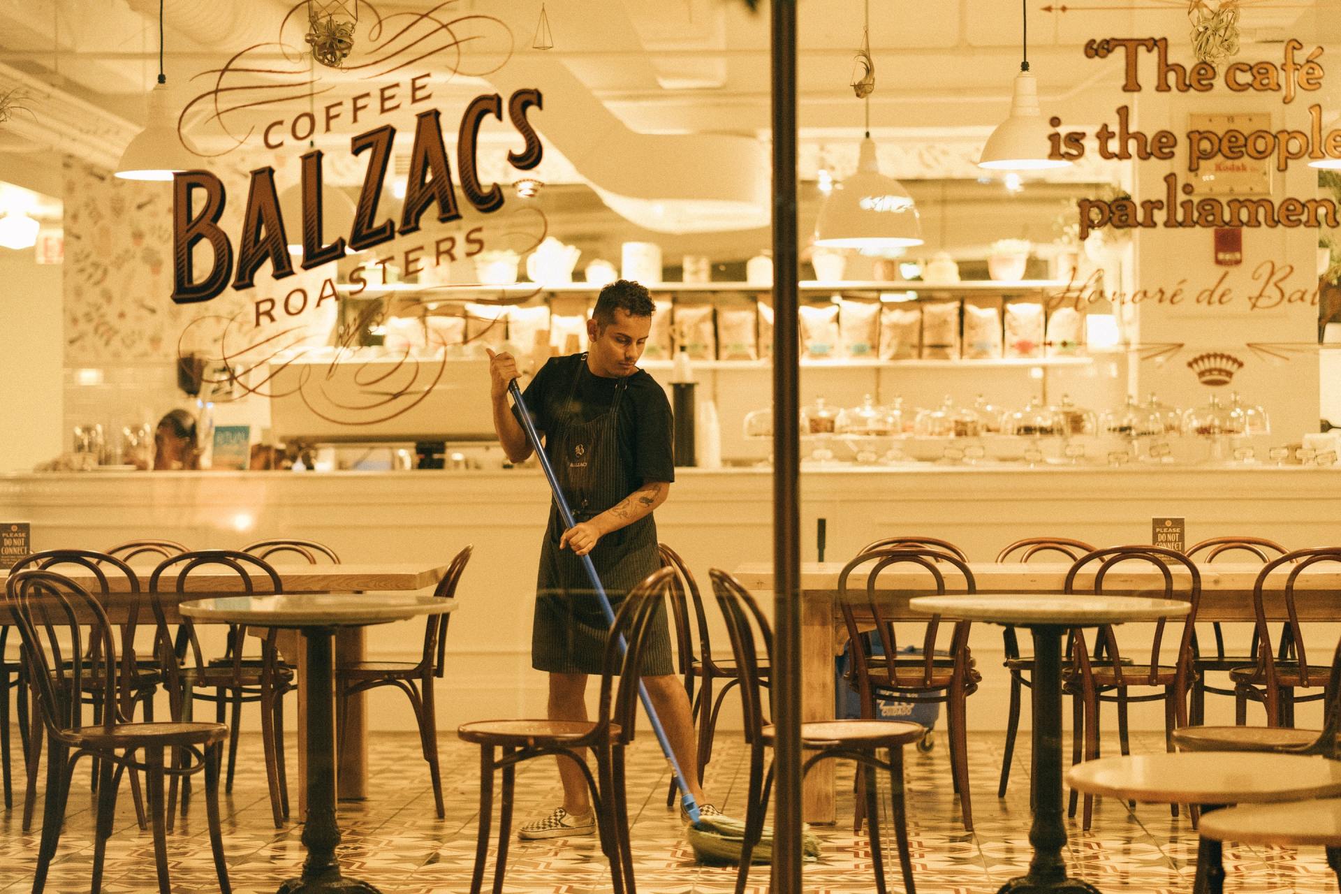 restaurant worker closing cafe
