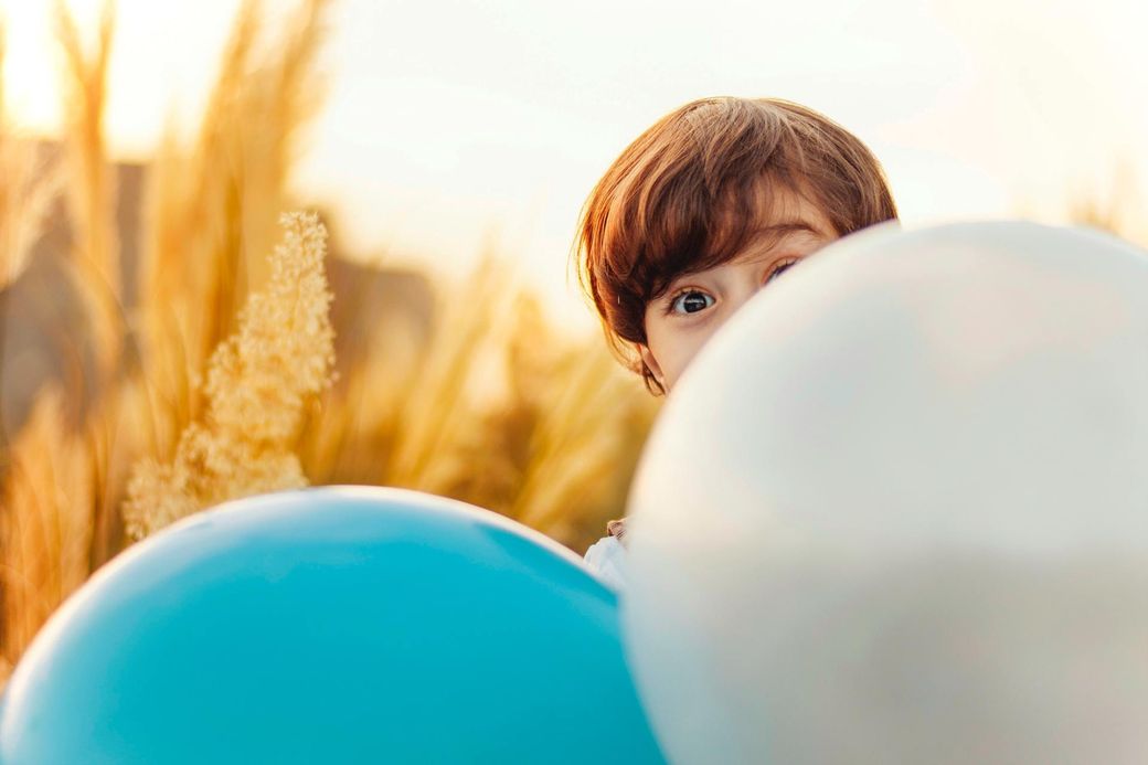 Young boy hiding