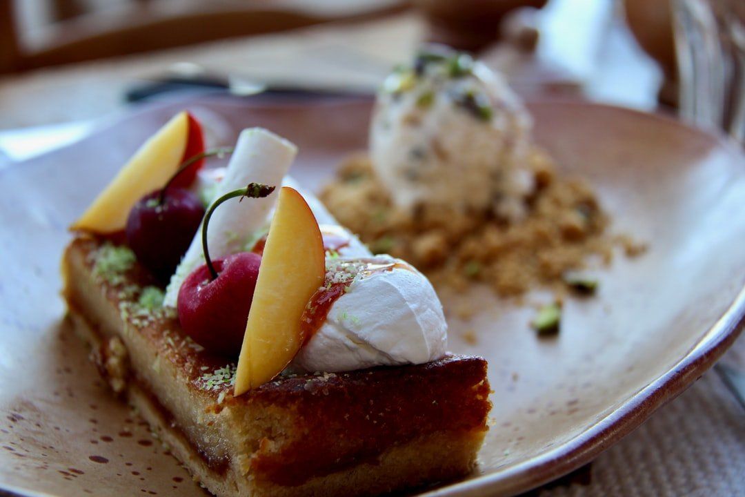 A close up of a dessert on a plate on a table.