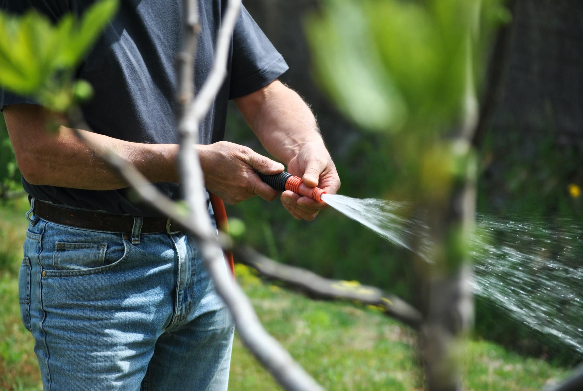 man holding a hose