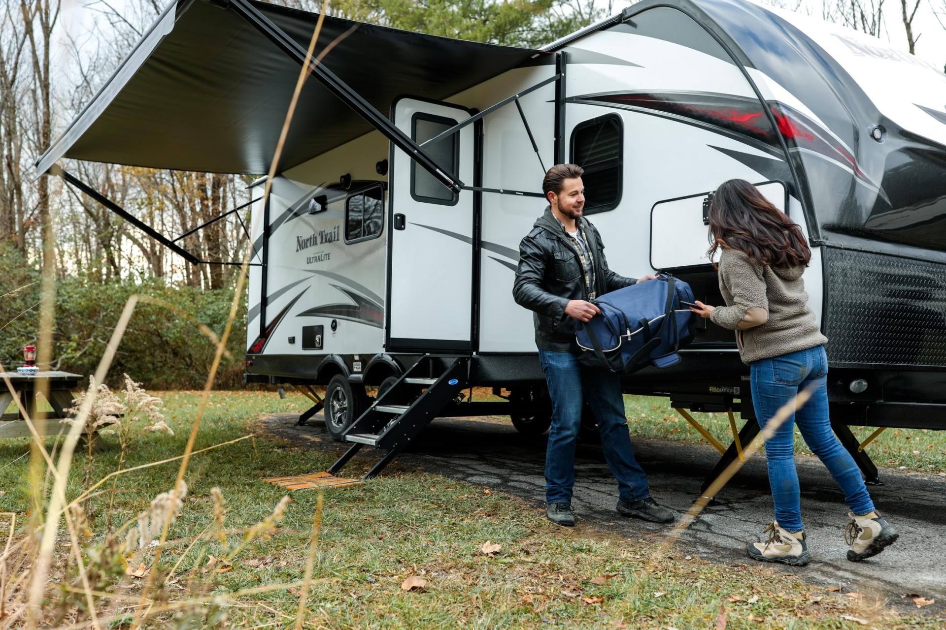 A couple unpacking their RV