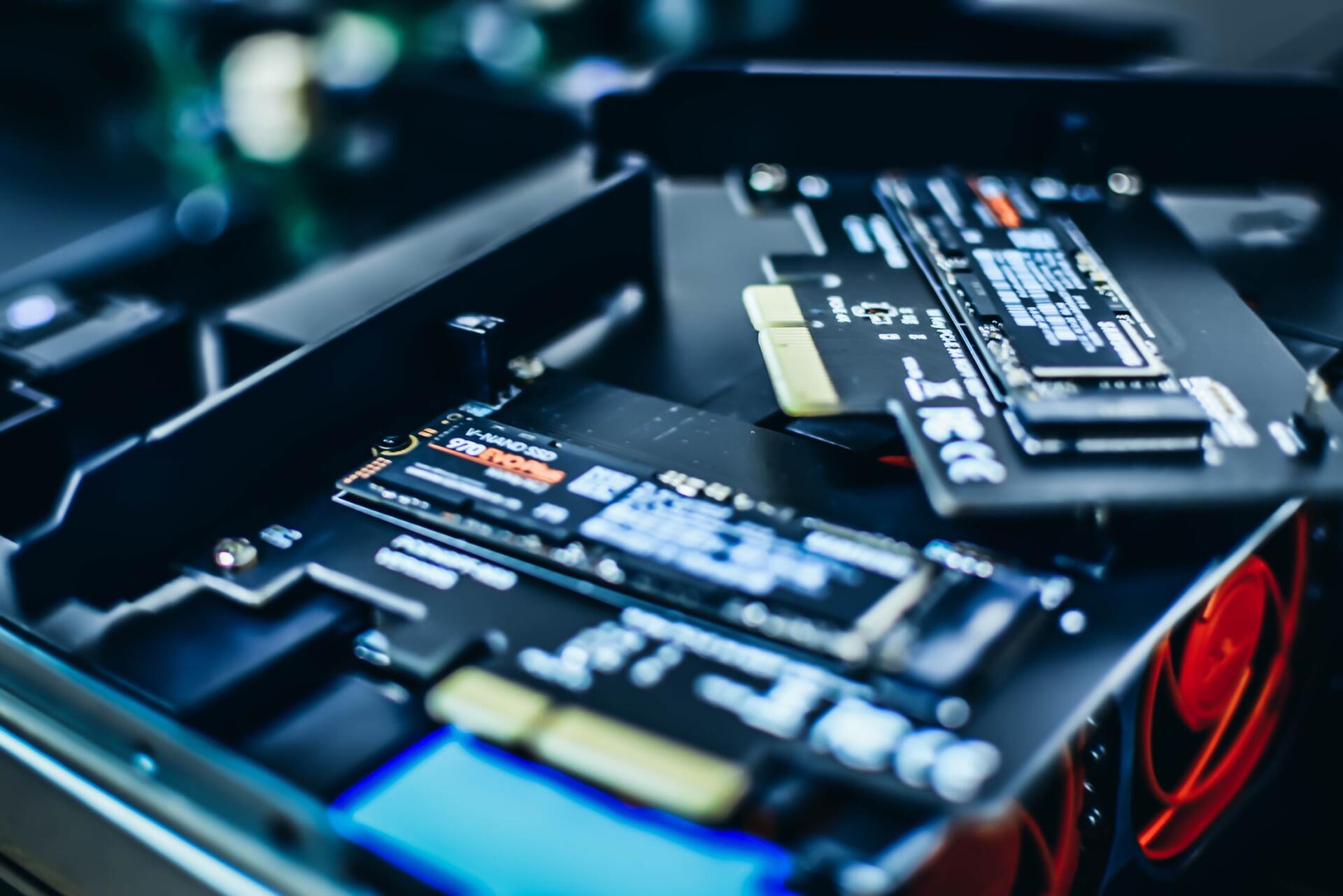 A close up of a motherboard in a computer case.