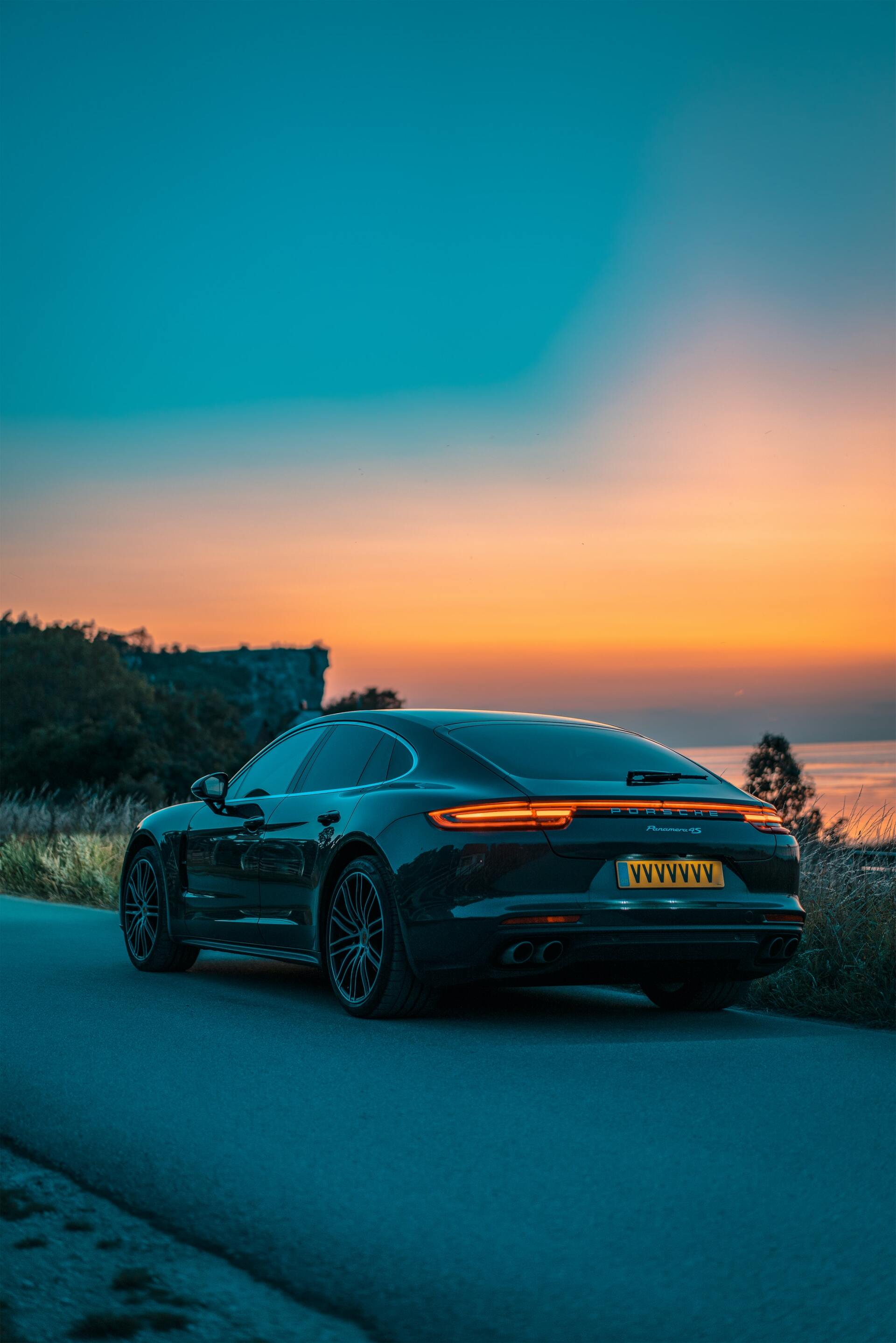 Car driving at sunset