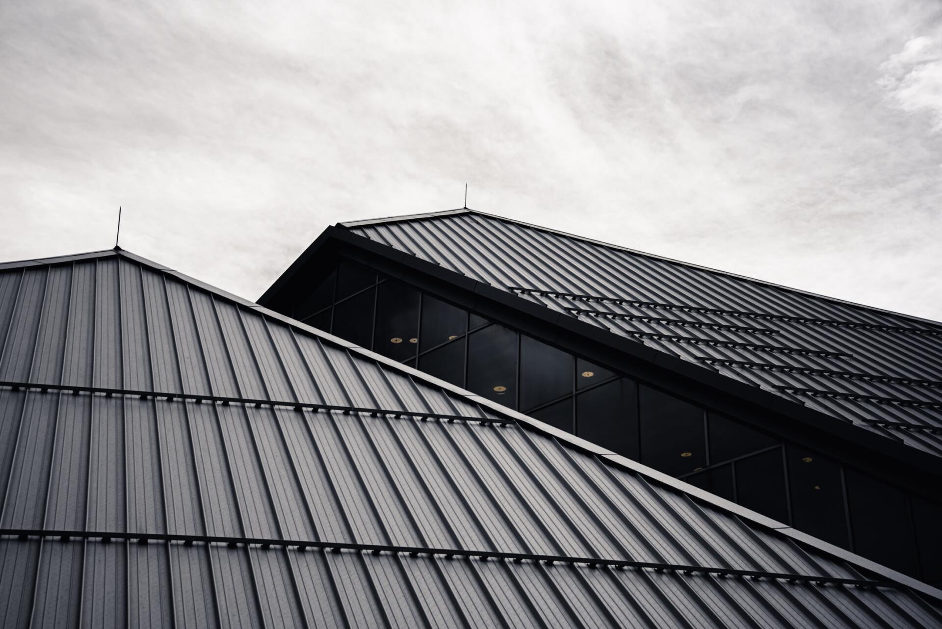 Gray Roof of a House in Lismore, Nsw — Mid Richmond Plumbers & Suppliers in Coraki, NSW